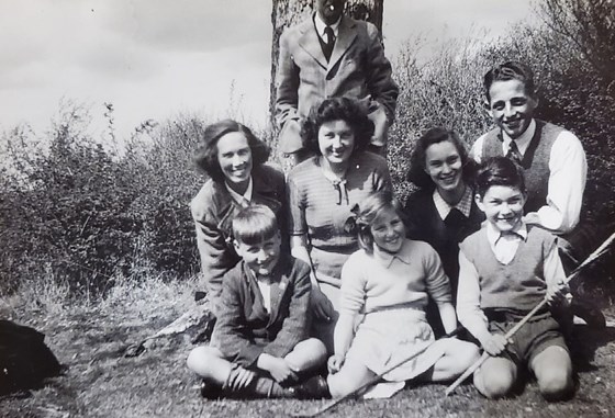 Dad with his Mum, May, his Dad Francis, his sisters, Mary, Margaret (Auntie Tim) and Ann (his twin).