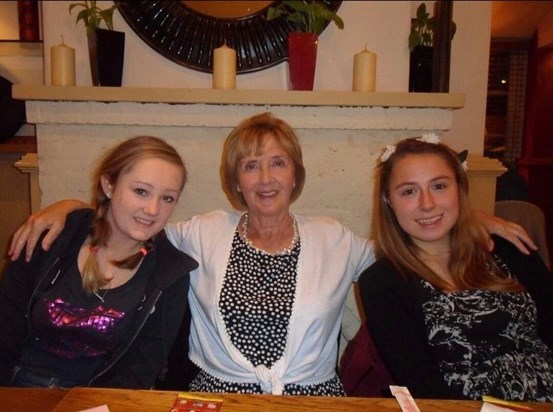 Mum with her granddaughters, Katie and Megan