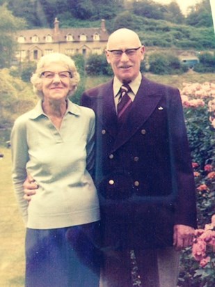 Tom and Joyce in their garden