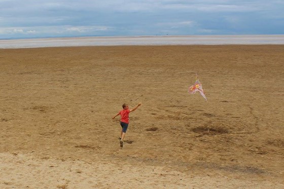 Edward, his kite and the whole beach