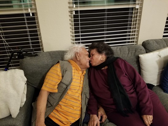 Grandparents kissing