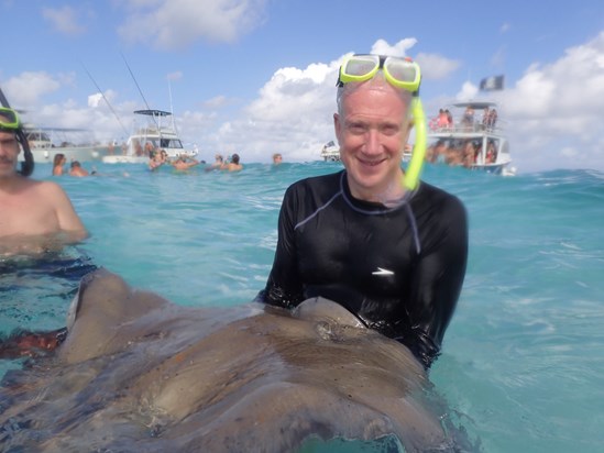 John with stingray in the Cayman Islands