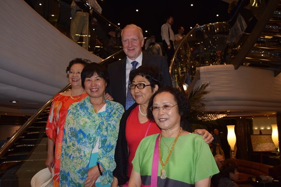 John on a cruise - these Japanese ladies are very impressed that he is fluent in their language.