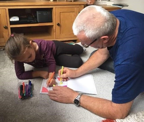 Dave with one of his grand-daughters