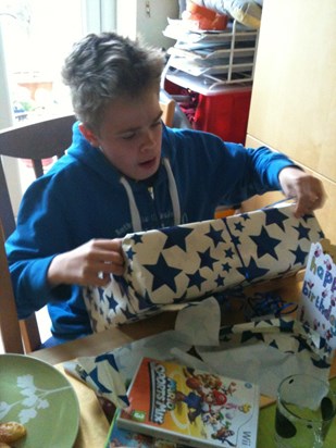 Unwrapping presents birthday 2011