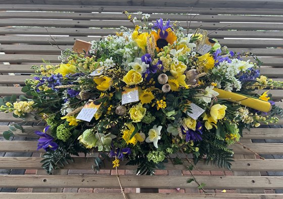 Flowers with cricket bat…