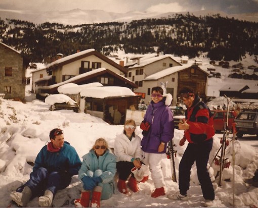 Karyn in purple (of course!) skiing with friends in the Alps