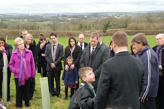 A deeply sad moment as we prepare to lower the casket