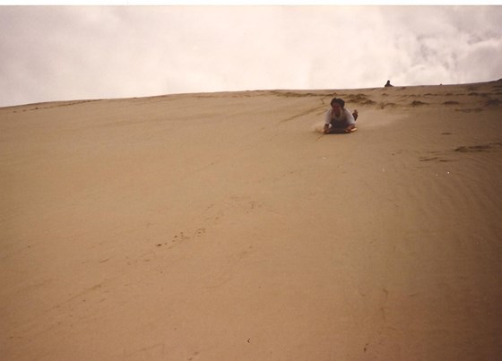 Sand tobogganing, Cape Reinga, New Zealand, 1995