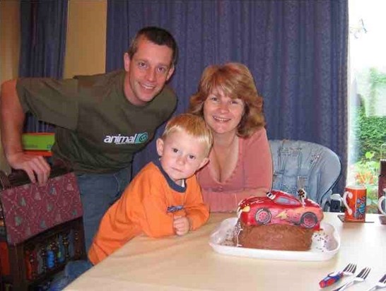 John with his wife Cathy and their son Scott