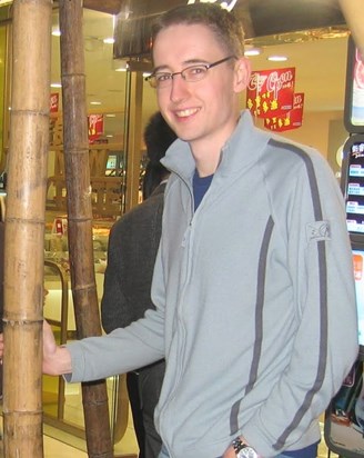 Inspecting some bamboo scaffolding, Beijing 2005