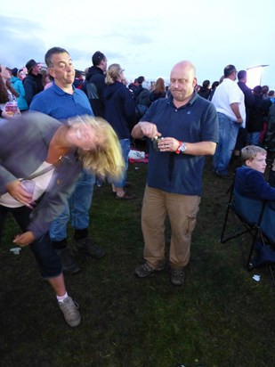 Having lost all his hair Fester decided not to join in with the head banging. Carfest 2014