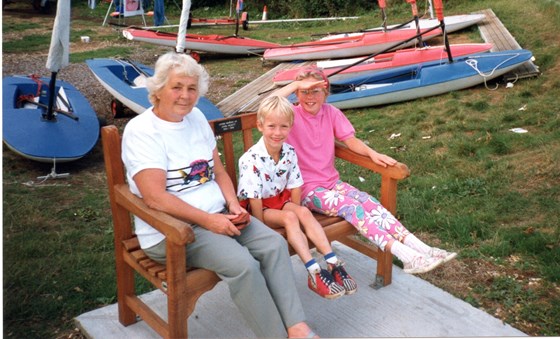 Margery with Naomi and Bradley on John's Memorial Bench at Cobnor