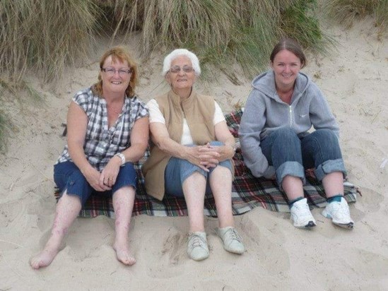 Sue, Muriel and Lisa on Bamburgh beach.