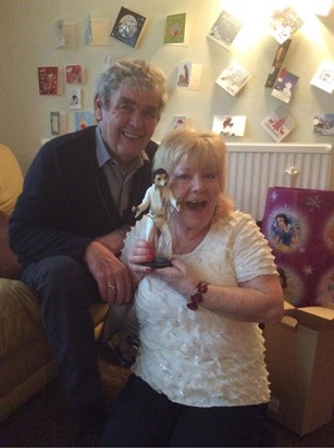 Dad, Mum and a meetkat dressed as Elvis Presley