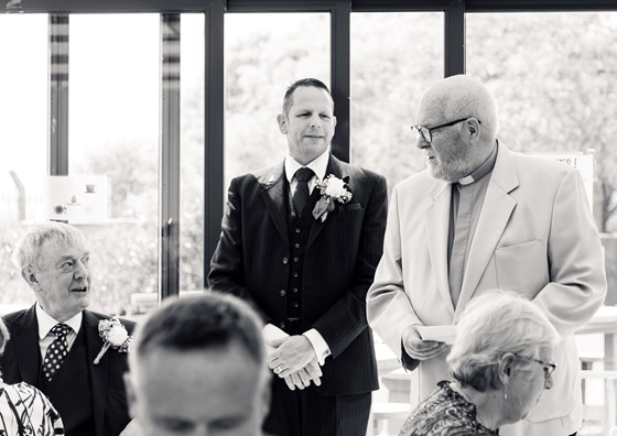 Reading the Grace at our Wedding. Dad and Paul joined the RN back in 1965. Paul remained a pillar of loyalty and and firm friend to Dad. I was also privileged to have him as a Godfather. Dad is Sat to the left in this photo with Sandra to the right.