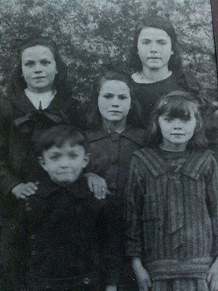 Sr Catherine as a child. LR- Sr Martina, Jack, Sr Imelda (middle). Sr Barbara, Sr Catherine (front)