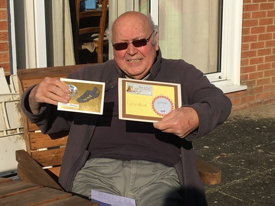 Dad with his 78th birthday cards from the kids