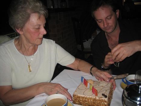 Mum's 70th, cutting the cake