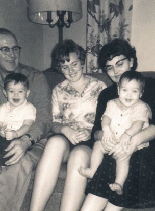 Grandpa Rambousek (holding Larry), Aunt Carol, Grandma Rambousek (holding Robyn)