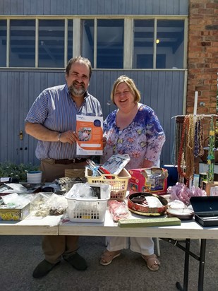 Neil and Jill Hayward with their table-top sale, summer 2018