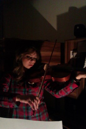 Elahe playing violin...