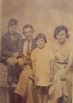 Betty with elder brother Dennis and parents