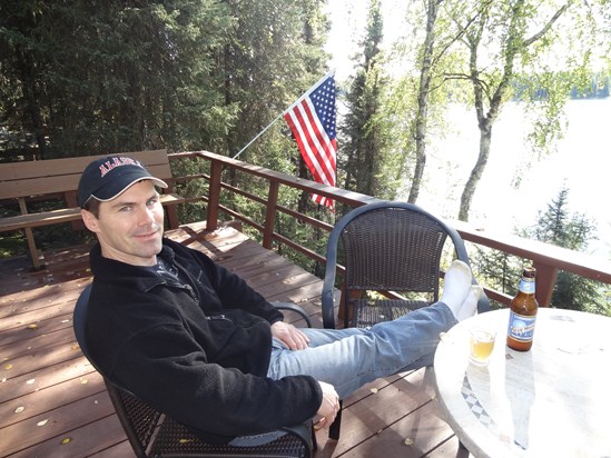 Kevin on the deck at our Nancy Lake cabin