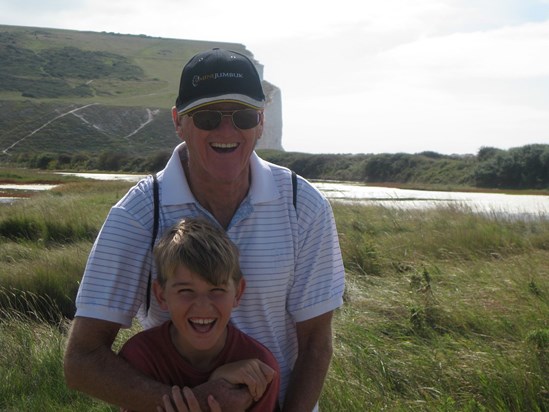 Dad and Finn in the sunshine at  Seven Sisters 