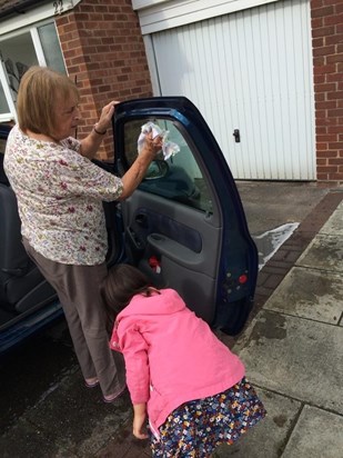 Our Charlie always up to stuff with nana x she loved washing her car xx