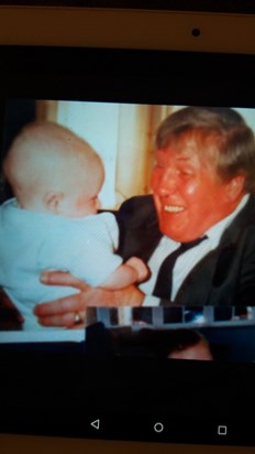 With grandson Andrew at his baptism in April 2000.