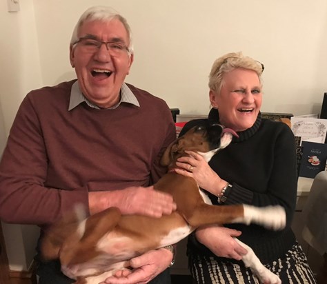 Dad laughing at Lola giving mum a kiss!