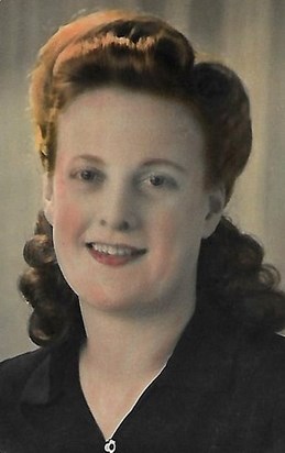 Peggy in the '40's. A tinted black and white photo; her hair really was that colour