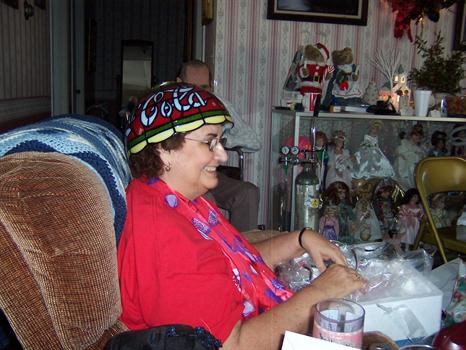 Mom on Christmas, with her new Coca Cola lamp.  :)  She was so funny.