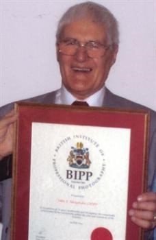 John with his lifetime achievement award from BIPP