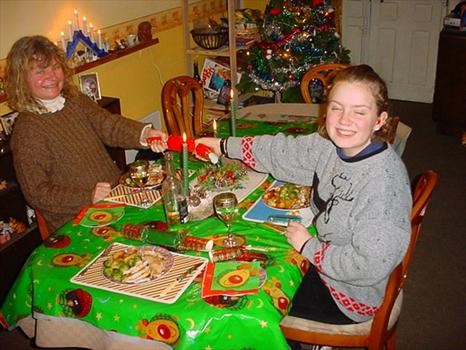 Debbie & Sarah pulling a Xmas cracker, 2002