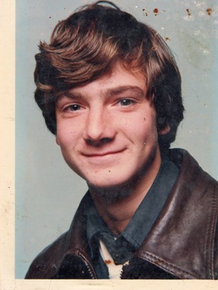 School photo 1983 . Uniform was not his style !
