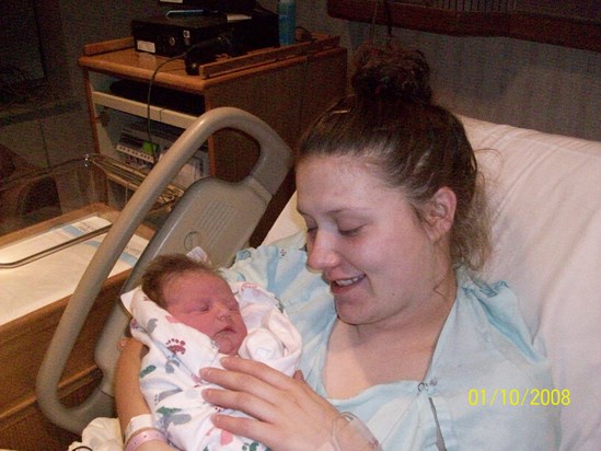 Josie holding Kailynn for the first time.