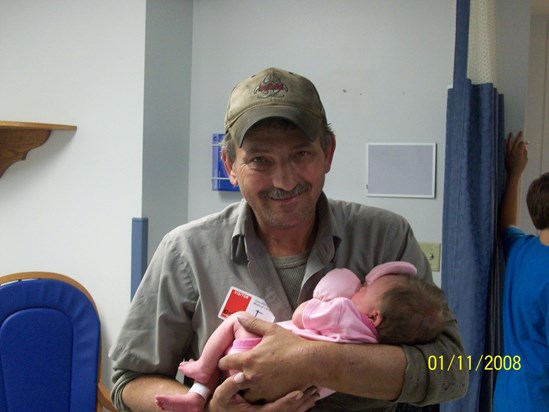 Pappaw Danny holding Kailynn.