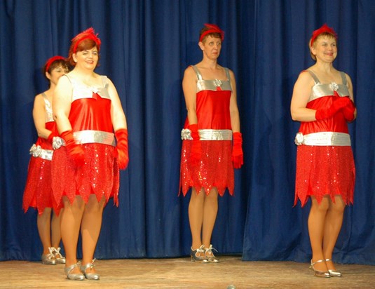 BMSD group in red and gold flapper dresses