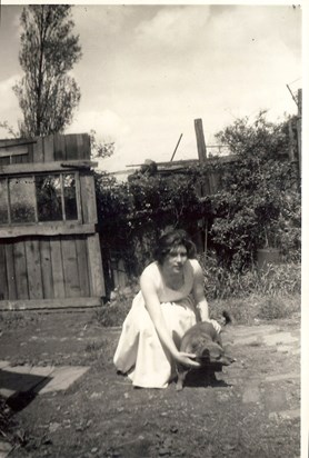 Mary with her Dog in the Back Garden
