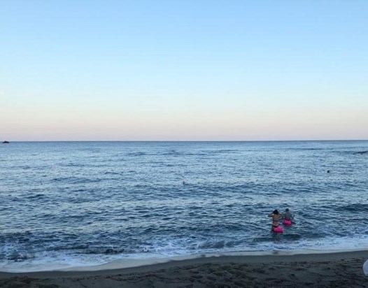Getting ready for a long sunrise swim (Janet on the right) with the 'pink guys', Isle of Ischia (Italy), August 2019