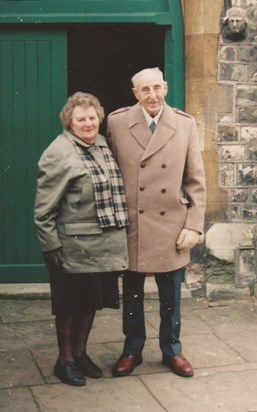 Eileen & Claude on their 50th wedding anniversary visiting the church where they were married