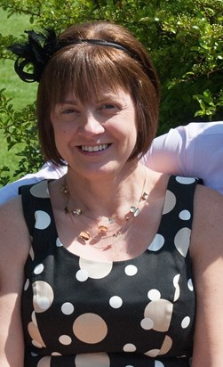 Carol, enjoying the sunshine at our daughter's wedding in May 2014. One of so many happy family days we enjoyed together. 