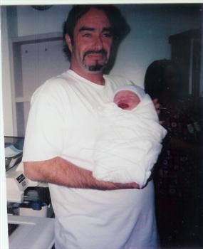 Daddys first time holding you his lil man