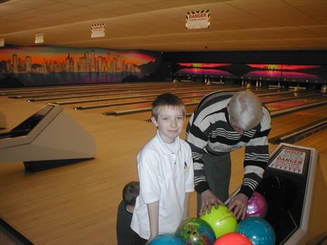 Bowling with his family.