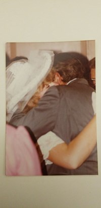 A hug from dad on JoAnne's wedding day 9/6/1980