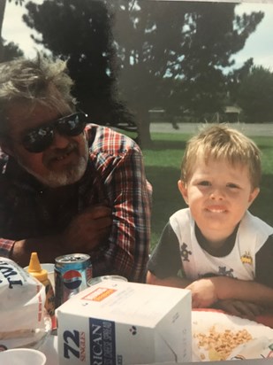Derek with grandpa on a family picnic to the park 