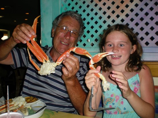 Hannah enjoying a crab with Grampy Bernard 2012 