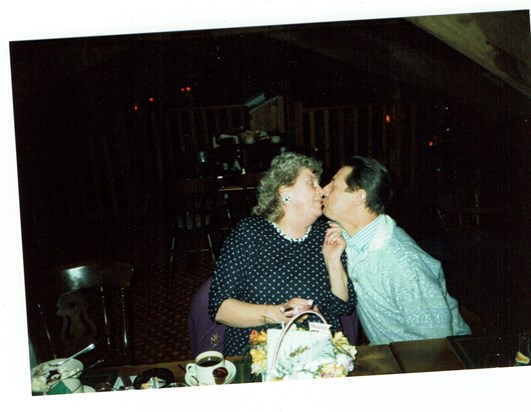 mum and dad kissing